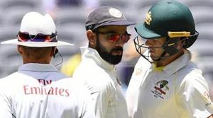 India's captain Virat Kohli (C) and Australia's captain Tim Paine react after Paine ran a single during play on day four of the second test match between Australia and India at Perth Stadium in Perth, Australia, December 17, 2018.(REUTERS) India's captain Virat Kohli (C) and Australia's captain Tim Paine react after Paine ran a single during play on day four of the second test match between Australia and India at Perth Stadium in Perth, Australia, December 17, 2018.(REUTERS)