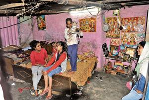 Slum dwellers say around five people share a bed in the shanties, while several families share a single bathroom.(Ravi Kumar/HT) Slum dwellers say around five people share a bed in the shanties, while several families share a single bathroom.(Ravi Kumar/HT)