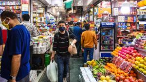 People in face masks throng to stock up on groceries amid a coronavirus fuelled panic, at INA Market, in New Delhi (Photo by Amal KS / Hindustan Times) People in face masks throng to stock up on groceries amid a coronavirus fuelled panic, at INA Market, in New Delhi (Photo by Amal KS / Hindustan Times)