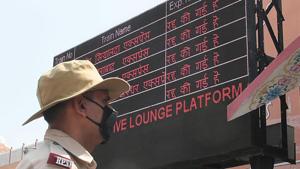 A railway police personnel stands next to a screen showing cancelled trains at Jaipur Railway Station on Sunday, as Rajasthan takes part in Janta Curfew.(Himanshu Vyas/HT Photo) A railway police personnel stands next to a screen showing cancelled trains at Jaipur Railway Station on Sunday, as Rajasthan takes part in Janta Curfew.(Himanshu Vyas/HT Photo)