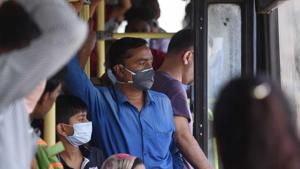 People seen wearing protective masks inside an overcrowded DTC bus during the first day of lockdown imposed by the state government to control the spread of coronavirus in New Delhi on Monday.(Sanchit Khanna/HT PHOTO) People seen wearing protective masks inside an overcrowded DTC bus during the first day of lockdown imposed by the state government to control the spread of coronavirus in New Delhi on Monday.(Sanchit Khanna/HT PHOTO)