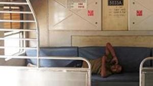A railway employee talks on the phone inside an empty train compartment after railway services were shutdown by the authorities to limit the spread of the coronavirus disease (COVID-19) in Mumbai, March 23, 2020(REUTERS) A railway employee talks on the phone inside an empty train compartment after railway services were shutdown by the authorities to limit the spread of the coronavirus disease (COVID-19) in Mumbai, March 23, 2020(REUTERS)