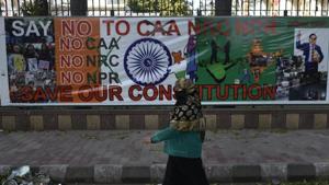 A woman walks near a protest site against against Citizenship Amendment Act (CAA), National Register of Citizens (NRC) and National Population Register, at Jamia Millia Islamia University, in New Delhi on February 14, 2020.(Burhaan Kinu/HT file photo) A woman walks near a protest site against against Citizenship Amendment Act (CAA), National Register of Citizens (NRC) and National Population Register, at Jamia Millia Islamia University, in New Delhi on February 14, 2020.(Burhaan Kinu/HT file photo)