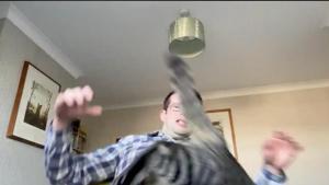 The image captures the man’s startled expression as the cat jumps on the computer.(Twitter/@colinwelch) The image captures the man’s startled expression as the cat jumps on the computer.(Twitter/@colinwelch)