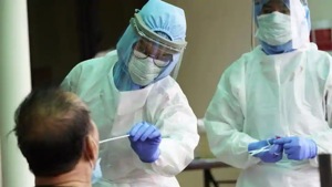 Health workers conduct a Covid-19 test in Petaling Jaya, Malaysia, on March 30.(AP) Health workers conduct a Covid-19 test in Petaling Jaya, Malaysia, on March 30.(AP)