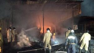 Fire fighters try to control a fire at Shaheen Bagh, in New Delhi, Sunday, March 29, 2020.(PTI)