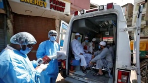 Men, who according to health and police officials had visited three Muslim missionary gatherings including in Nizamuddin area of New Delhi, wearing protective masks sit in an ambulance that will take them to a quarantine facility amid concerns about the spread of coronavirus disease (COVID-19), in Ahmedabad.(Reuters) Men, who according to health and police officials had visited three Muslim missionary gatherings including in Nizamuddin area of New Delhi, wearing protective masks sit in an ambulance that will take them to a quarantine facility amid concerns about the spread of coronavirus disease (COVID-19), in Ahmedabad.(Reuters)