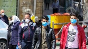 Iranians wear protective face masks to check the spread of coronavirus disease Covid-19, in capital Tehran on April 5.(AFP Photo) Iranians wear protective face masks to check the spread of coronavirus disease Covid-19, in capital Tehran on April 5.(AFP Photo)