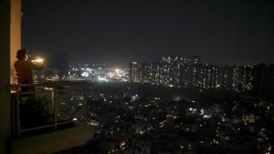 All across Noida, people came up with creative ways to mark the nine minutes.(AP) All across Noida, people came up with creative ways to mark the nine minutes.(AP)