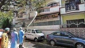 Fire service personnel spray disinfectant, on day fourteen of the 21 day nationwide lockdown to check the spread of coronavirus, during sanitization of the residential area adjoining Nizamuddin Dargah in New Delhi.(Vipin Kumar/ Hindustan Times) Fire service personnel spray disinfectant, on day fourteen of the 21 day nationwide lockdown to check the spread of coronavirus, during sanitization of the residential area adjoining Nizamuddin Dargah in New Delhi.(Vipin Kumar/ Hindustan Times)