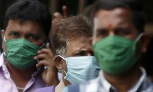 FILE PHOTO: Men wearing protective masks walk inside the premises of a hospital where a special ward has been set up for the coronavirus disease in Mumbai, India, March 17, 2020. REUTERS/Francis Mascarenhas(REUTERS) FILE PHOTO: Men wearing protective masks walk inside the premises of a hospital where a special ward has been set up for the coronavirus disease in Mumbai, India, March 17, 2020. REUTERS/Francis Mascarenhas(REUTERS)