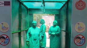 Medical staff in protective gear walk through a disinfecting tunnel outside Civil Hospital Sector 10 of Gurugram.(Yogendra Kumar/HT PHOTO) Medical staff in protective gear walk through a disinfecting tunnel outside Civil Hospital Sector 10 of Gurugram.(Yogendra Kumar/HT PHOTO)