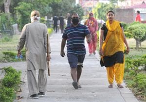 Residents out for a morning walk in Sector 45, Chandigarh, on Saturday, despite the curfew in the city.(KESHAV SINGH/HT) Residents out for a morning walk in Sector 45, Chandigarh, on Saturday, despite the curfew in the city.(KESHAV SINGH/HT)