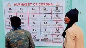 Police paste a poster in Jamtara.(HT photo) Police paste a poster in Jamtara.(HT photo)