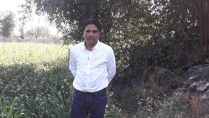 Chandmal Jingar works as a nurse at the Covid-19 ward of Bhilwara’s district hospital.(HT Photo) Chandmal Jingar works as a nurse at the Covid-19 ward of Bhilwara’s district hospital.(HT Photo)