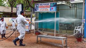 GHMC workers spray disinfectant at a Government Fever Hospital where a Covid-19 helpdesk and isolation ward for patients has been set up in Hyderabad.(PTI PHOTO.) GHMC workers spray disinfectant at a Government Fever Hospital where a Covid-19 helpdesk and isolation ward for patients has been set up in Hyderabad.(PTI PHOTO.)