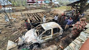 Locals survey the damage caused by Pakistani shelling in north Kashmir's Kupwara district on Monday.(ANI) Locals survey the damage caused by Pakistani shelling in north Kashmir's Kupwara district on Monday.(ANI)