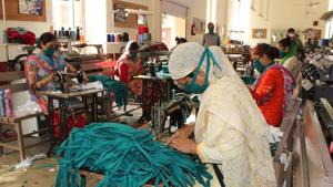 Inmates and their families stitching safety masks at the Paraplegic Rehabilitation Centre in Mohali’s Phase 6 on Sunday.(Gurminder Singh/HT photo) Inmates and their families stitching safety masks at the Paraplegic Rehabilitation Centre in Mohali’s Phase 6 on Sunday.(Gurminder Singh/HT photo)