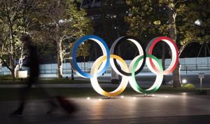 The Olympic rings are seen in Tokyo, Japan. The Tokyo Olympics will open next year in the same time slot scheduled for this year’s games.(AP File) The Olympic rings are seen in Tokyo, Japan. The Tokyo Olympics will open next year in the same time slot scheduled for this year’s games.(AP File)