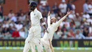 Australia's Nathan Lyon appeals for the wicket of India's Cheteshwar Pujara as India's Virat Kohli, left.(AP)