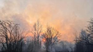 This picture taken on April 5, 2020, shows a forest fire burning at a 30-kilometer (19-mile) Chernobyl exclusion zone, not far from the nuclear power plant. -(AFP) This picture taken on April 5, 2020, shows a forest fire burning at a 30-kilometer (19-mile) Chernobyl exclusion zone, not far from the nuclear power plant. -(AFP)