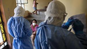 Doctors take notes after performing a new coronavirus fast test in Lima, Peru, Monday, April 13, 2020. Peruvians can call a telephone number to report that they have symptoms of COVID-19, and the state organized medical brigades will visit and do rapid tests to confirm or rule out new COVID-19 infections. (AP Photo/Rodrigo Abd)(AP) Doctors take notes after performing a new coronavirus fast test in Lima, Peru, Monday, April 13, 2020. Peruvians can call a telephone number to report that they have symptoms of COVID-19, and the state organized medical brigades will visit and do rapid tests to confirm or rule out new COVID-19 infections. (AP Photo/Rodrigo Abd)(AP)