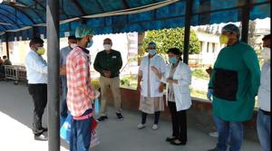 Doctors interacting with the patient after he got discharged in Ambala on Tuesday.(HT PHOTO) Doctors interacting with the patient after he got discharged in Ambala on Tuesday.(HT PHOTO)