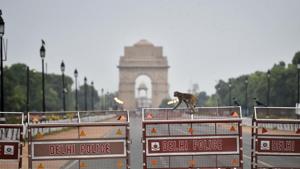 Police barricades seen at Rajpath during the lockdown in New Delhi on Tuesday. A deserted India Gate can also be seen in the background.(AJAY AGGARWAL/HT PHOTO.) Police barricades seen at Rajpath during the lockdown in New Delhi on Tuesday. A deserted India Gate can also be seen in the background.(AJAY AGGARWAL/HT PHOTO.)