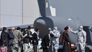 Medics screen Indian nationals after they were brought to India by Indian Air Force's (IAF) C-17 Globemaster III aircraft from coronavirus-hit Iran at Hindan airport, Tuesday, March 10, 2020.(PTI) Medics screen Indian nationals after they were brought to India by Indian Air Force's (IAF) C-17 Globemaster III aircraft from coronavirus-hit Iran at Hindan airport, Tuesday, March 10, 2020.(PTI)