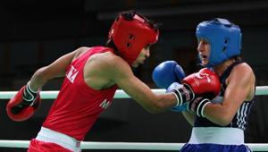Ayako Minowa (Blue) of Germany fights against Sonia Lather (Red) of India in the Women’s 54kg preliminary match during the AIBA Women’s World Boxing Championships on May 13, 2012.(Biplov Bhuyan/HT PHOTO) Ayako Minowa (Blue) of Germany fights against Sonia Lather (Red) of India in the Women’s 54kg preliminary match during the AIBA Women’s World Boxing Championships on May 13, 2012.(Biplov Bhuyan/HT PHOTO)