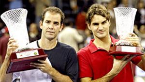 The Kings together: Switzerland's Roger Federer and Pete Sampras of the U.S. celebrate after their friendly match in Macau on Saturday. The Kings together: Switzerland's Roger Federer and Pete Sampras of the U.S. celebrate after their friendly match in Macau on Saturday.