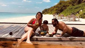 Kareena Kapoor Khan shared her beach vacation picture with hubby Saif Ali Khan and son Taimur and captioned it, “I am not dreaming of beaches... You are!#TakeMeBack.”(Instagram) Kareena Kapoor Khan shared her beach vacation picture with hubby Saif Ali Khan and son Taimur and captioned it, “I am not dreaming of beaches... You are!#TakeMeBack.”(Instagram)