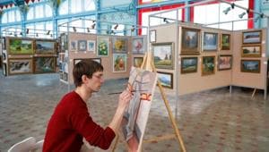 Artist Sergei Pronin works on a painting, which depicts a monument to Russian poet Alexander Pushkin, in an art gallery in Zheleznovodsk, Russia April 15, 2020. Artist Sergei Pronin paints a plate in an art gallery in Zheleznovodsk, Russia April 15, 2020. REUTERS/Eduard Korniyenko(REUTERS) Artist Sergei Pronin works on a painting, which depicts a monument to Russian poet Alexander Pushkin, in an art gallery in Zheleznovodsk, Russia April 15, 2020. Artist Sergei Pronin paints a plate in an art gallery in Zheleznovodsk, Russia April 15, 2020. REUTERS/Eduard Korniyenko(REUTERS)
