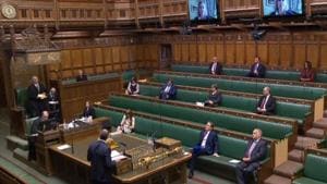 A video grab from footage broadcast by the UK Parliament's Parliamentary Recording Unit (PRU) shows Britain's Foreign Secretary Dominic Raab answering a remote question from Conservative MP for Hastings and Rye, Sally-Ann Hart, seen on a screen above the benches, during Prime Minister's Question time (PMQs) in the House of Commons in London.(AFP) A video grab from footage broadcast by the UK Parliament's Parliamentary Recording Unit (PRU) shows Britain's Foreign Secretary Dominic Raab answering a remote question from Conservative MP for Hastings and Rye, Sally-Ann Hart, seen on a screen above the benches, during Prime Minister's Question time (PMQs) in the House of Commons in London.(AFP)