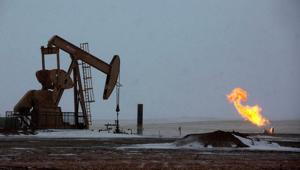 Natural gas flares are seen at an oil pump site outside of Williston, North Dakota.(Reuters File Photo) Natural gas flares are seen at an oil pump site outside of Williston, North Dakota.(Reuters File Photo)