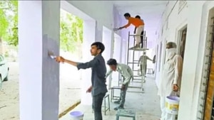 The workers began cleaning and painting the school to get over their boredom and also as a token of gratitude for Palsana residents for taking good care of them.(Twitter/@ramanmann1974) The workers began cleaning and painting the school to get over their boredom and also as a token of gratitude for Palsana residents for taking good care of them.(Twitter/@ramanmann1974)