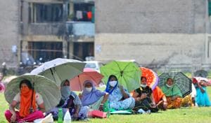 Residents queued up during ration distribution at Sector 56 in Chandigarh on Saturday.(Ravi Kumar/HT) Residents queued up during ration distribution at Sector 56 in Chandigarh on Saturday.(Ravi Kumar/HT)