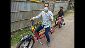 Partha Saha, an YouTuber of Agartala designs motorbike to spread message of social distancing(HT File Photo) Partha Saha, an YouTuber of Agartala designs motorbike to spread message of social distancing(HT File Photo)
