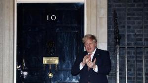 Britain's Prime Minister Boris Johnson applauds outside 10 Downing Street during the Clap for our carers campaign in support of the NHS, as the spread of the coronavirus disease (Covid-19) continues in London.(Reuters/ File photo)