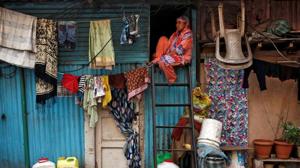 Coronavirus update: A woman sits on a ladder installed outside her house, during a nationwide lockdown in India to slow the spread of Covid-19 in Mumbai, India, April 13, 2020.(Reuters file photo) Coronavirus update: A woman sits on a ladder installed outside her house, during a nationwide lockdown in India to slow the spread of Covid-19 in Mumbai, India, April 13, 2020.(Reuters file photo)