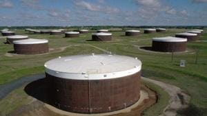 An aerial drone view of a crude oil storage facility on April 23, 2020 in Cushing, Oklahoma. Governor Stitt has said that ‘over-production of oil continues to threaten the economy.’(AFP) An aerial drone view of a crude oil storage facility on April 23, 2020 in Cushing, Oklahoma. Governor Stitt has said that ‘over-production of oil continues to threaten the economy.’(AFP)