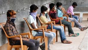 People wait for their samples to be taken at a coronavirus testing centre during lockdown to curb spread of Covid-19, in Ranchi, Jharkhand, Sunday, April 26, 2020.(Diwakar Prasad / HT Photo) People wait for their samples to be taken at a coronavirus testing centre during lockdown to curb spread of Covid-19, in Ranchi, Jharkhand, Sunday, April 26, 2020.(Diwakar Prasad / HT Photo)