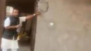 BLP MLA Brajbhushan Rajput seen screaming at the Muslim vegetable vendor. (Videograb) BLP MLA Brajbhushan Rajput seen screaming at the Muslim vegetable vendor. (Videograb)
