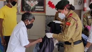National Cadet Corps girls gifted clean pair of clothes to migrant workers National Cadet Corps girls gifted clean pair of clothes to migrant workers