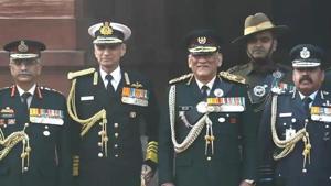 Chief of Defence Staff (CDS) General Bipin Rawat, second right, with Indian Air Force Air Chief Marshal Rakesh Kumar Singh Bhadauria, right, India Army Chief General Manoj Mukund Naravane, left, and the chief of Indian Naval staff Admiral Karambir Singh.(AP) Chief of Defence Staff (CDS) General Bipin Rawat, second right, with Indian Air Force Air Chief Marshal Rakesh Kumar Singh Bhadauria, right, India Army Chief General Manoj Mukund Naravane, left, and the chief of Indian Naval staff Admiral Karambir Singh.(AP)