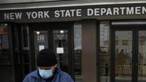 Visitors to the Department of Labor are turned away at the door by personnel due to closures over coronavirus concerns, Wednesday, March 18, 2020, in New York. Applications for jobless benefits are surging in some states as coronavirus concerns shake the U.S. economy.(AP) Visitors to the Department of Labor are turned away at the door by personnel due to closures over coronavirus concerns, Wednesday, March 18, 2020, in New York. Applications for jobless benefits are surging in some states as coronavirus concerns shake the U.S. economy.(AP)