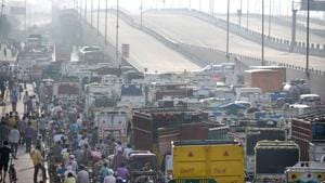 Traffic seen on NH-9 during lockdown, near Ghazipur Mandi (vegetable/ fruit market), in New Delhi, India (Photo by Sushil Kumar/Hindustan Times) Traffic seen on NH-9 during lockdown, near Ghazipur Mandi (vegetable/ fruit market), in New Delhi, India (Photo by Sushil Kumar/Hindustan Times)