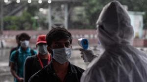 A student is thermal screened on Sunday at ISBT in Delhi’s Kashmere Gate after being brought back from Rajasthan's Kota.(Biplov Bhuyan/HT PHOTO) A student is thermal screened on Sunday at ISBT in Delhi’s Kashmere Gate after being brought back from Rajasthan's Kota.(Biplov Bhuyan/HT PHOTO)