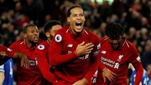 Liverpool's Divock Origi celebrates scoring their first goal with Virgil van Dijk and team mates.(REUTERS) Liverpool's Divock Origi celebrates scoring their first goal with Virgil van Dijk and team mates.(REUTERS)