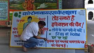 An art teacher at a Delhi Government school, seen making a coronavirus awareness banner.(Sanchit Khanna/HT File Photo) An art teacher at a Delhi Government school, seen making a coronavirus awareness banner.(Sanchit Khanna/HT File Photo)